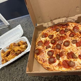 Medium 12" Pizza with One Topping & 10 Wings Special